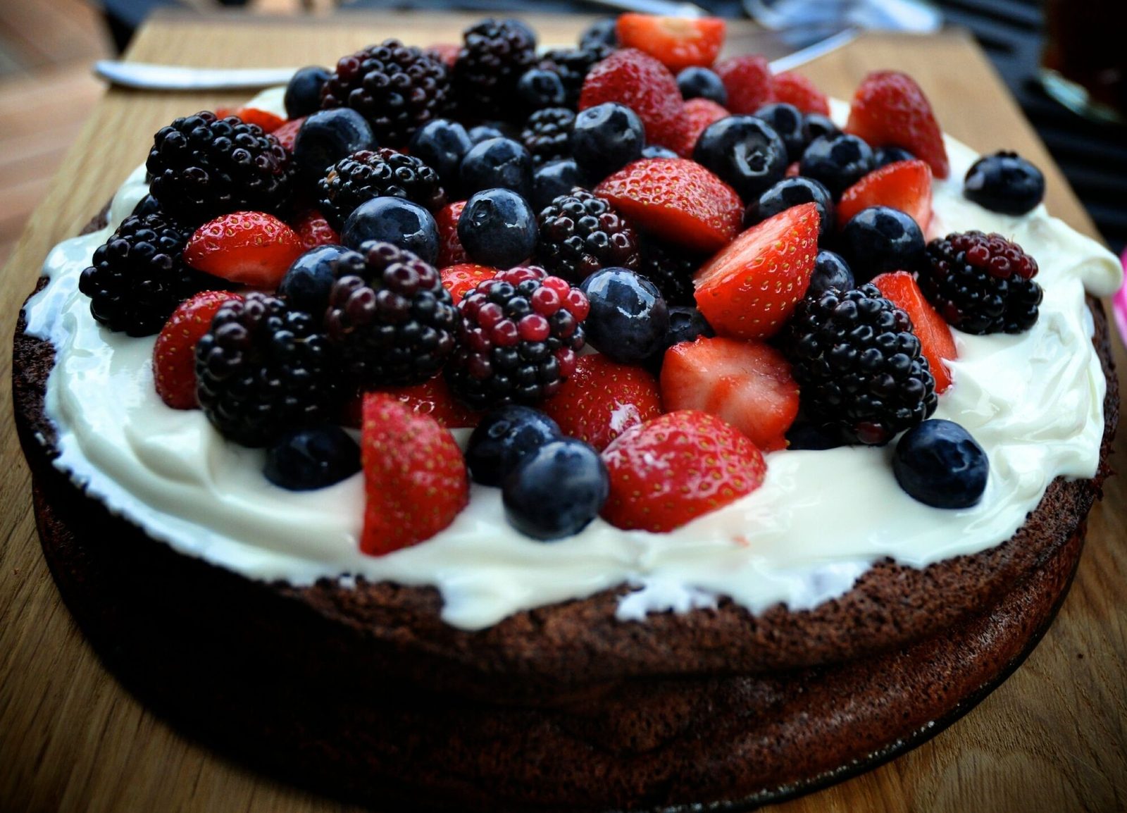 Feyzan’s Chocolate Torte with Crème Fraîche & Berries