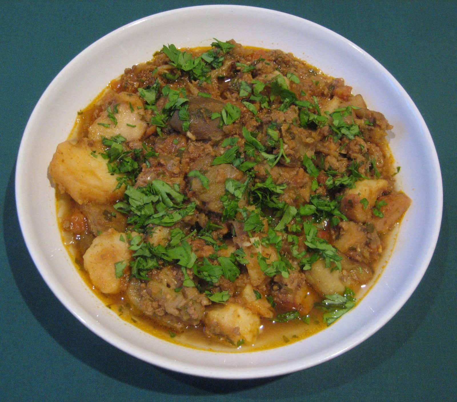 Aubergines and Potatoes with minced beef and tomatoes
