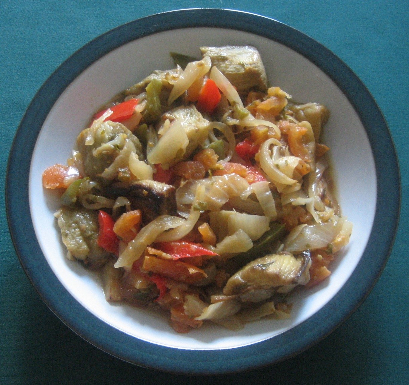Aubergines with onions, tomatoes, garlic & parsley