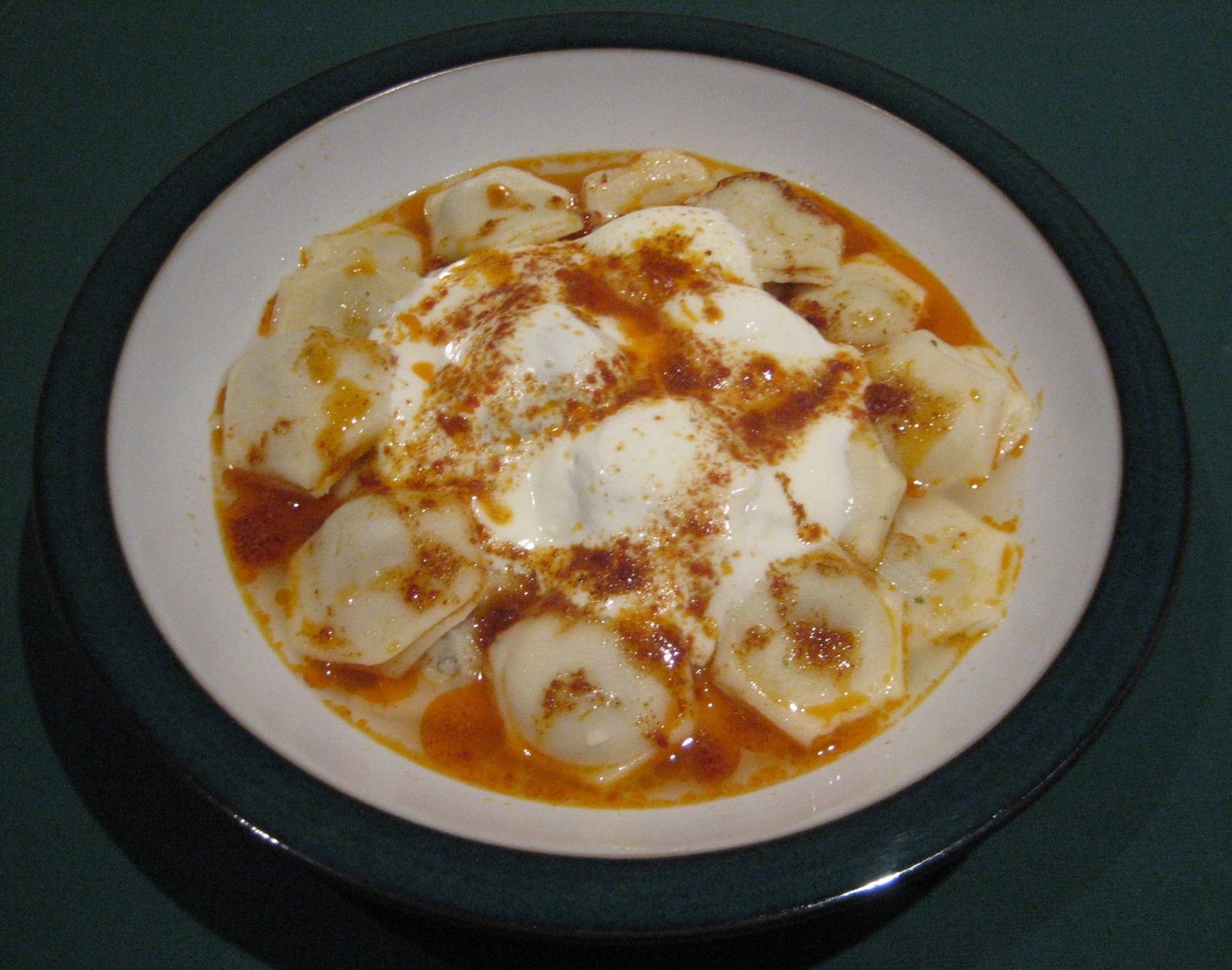 Mantı Stuffed pasta with garlic yoghurt sauce and tomato-infused butter